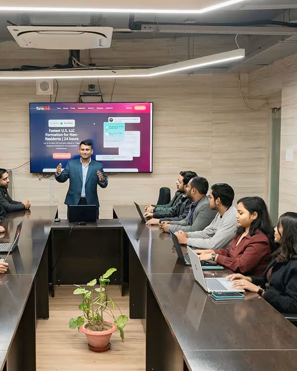 Tousif Akram working with clients