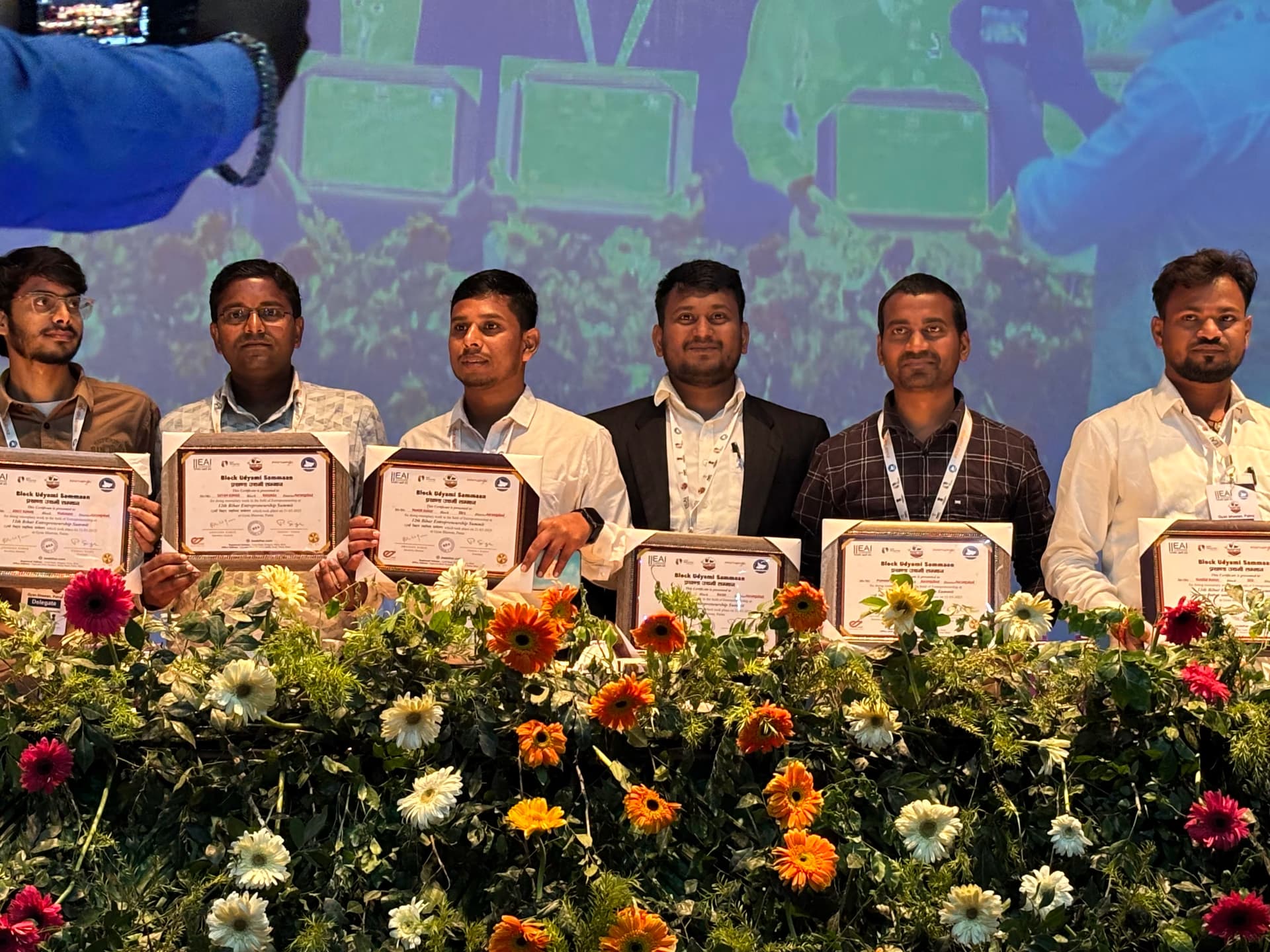 Award ceremony — trophy and stage recognition